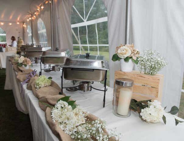 Wedding serving table under tent