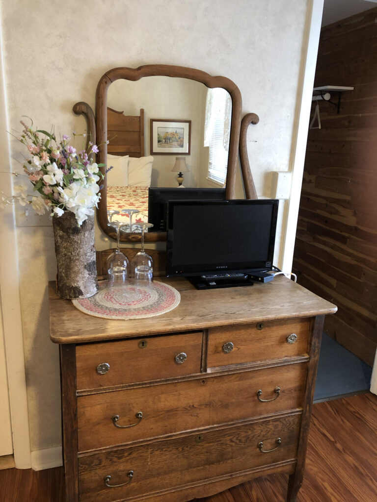 Old dresser with large wooden mirrorl
