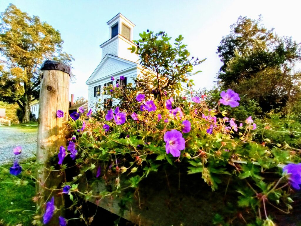 Coolidge Homestead with flowers in foreground